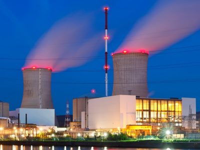 Power plant with red L-864 lights at night