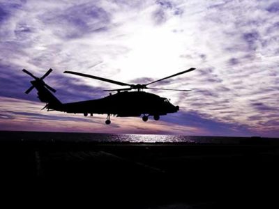 helicopter at sunset