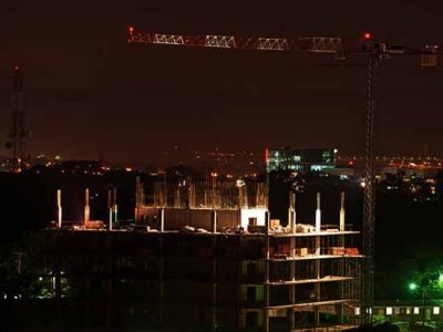 Tower cranes are marked with paint for day and red/infrared lights for night